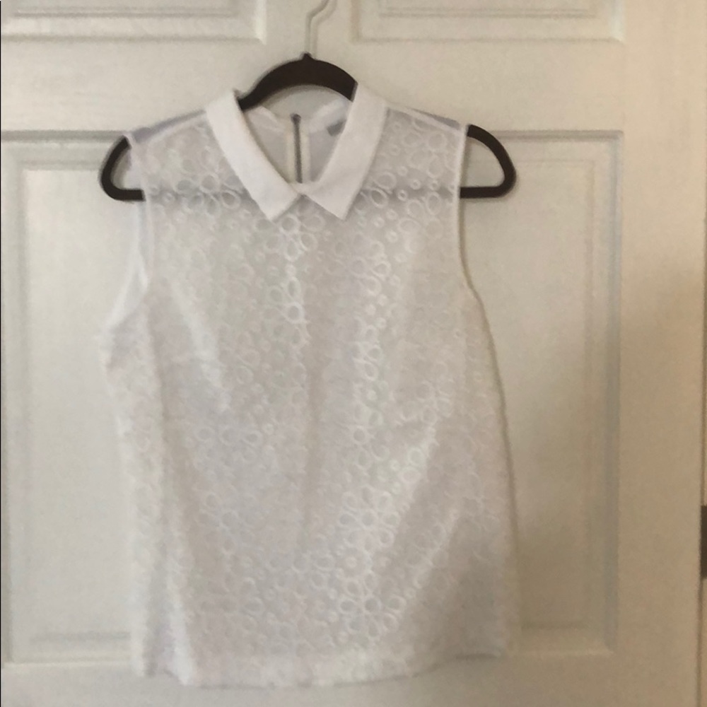 White sleeveless top